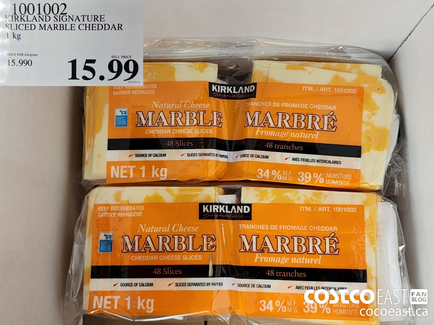 1001002 KIRKLAND SIGNATURE SLICED MARBLE CHEDDAR 1 KG $15.99