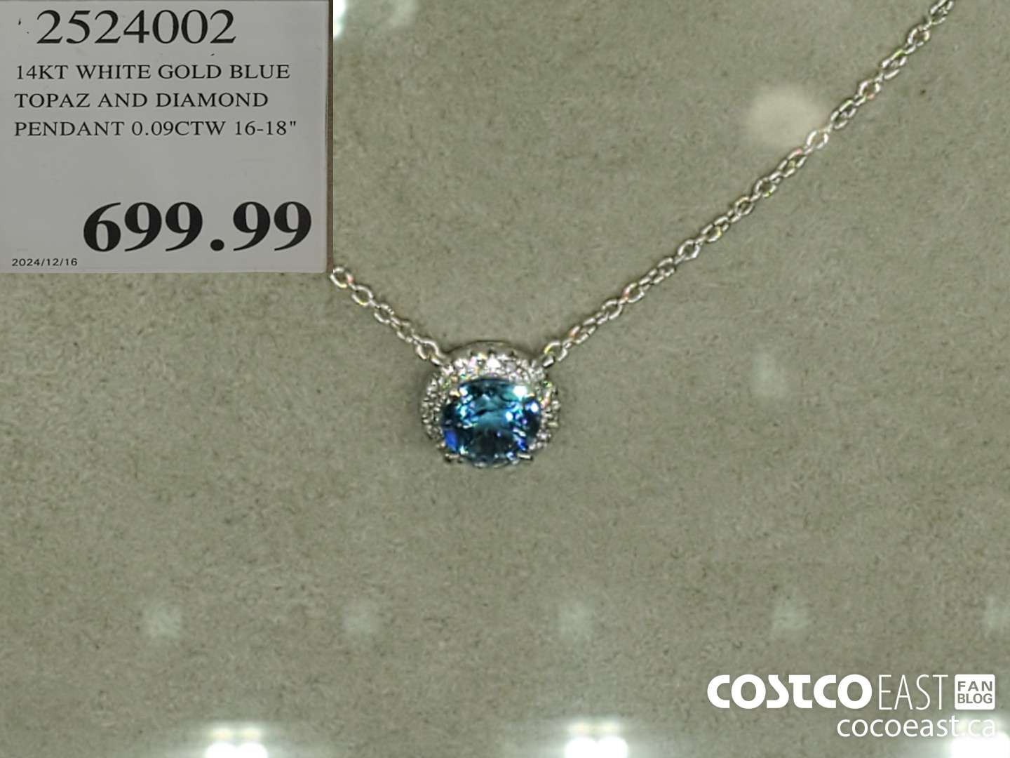 2524002 14KT WHITE GOLD BLUE TOPAZ AND DIAMOND PENDANT 0.09CTW 16-18