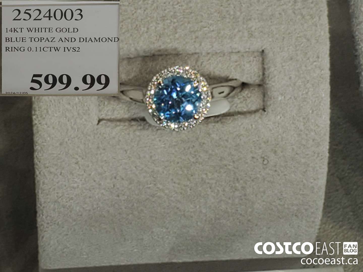 2524003 14KT WHITE GOLD BLUE TOPAZ AND DIAMOND RING 0.11CTW IVS2  $599.99