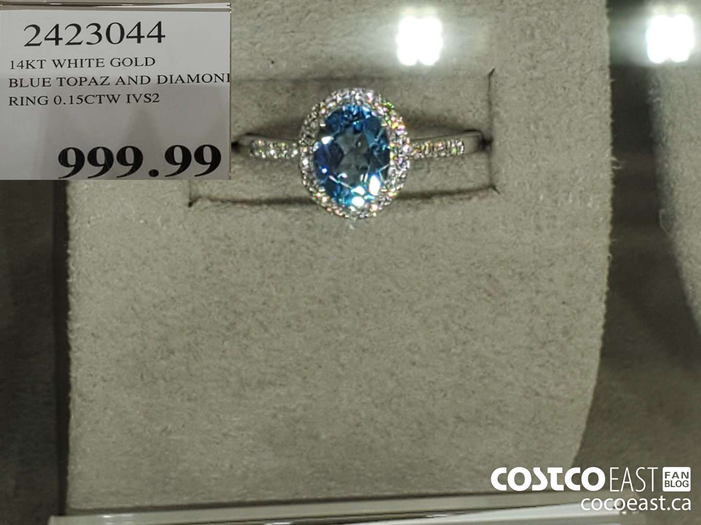 2423044 14KT WHITE GOLD BLUE TOPAZ AND DIAMON RING 0.15CTW IVS2  $999.99