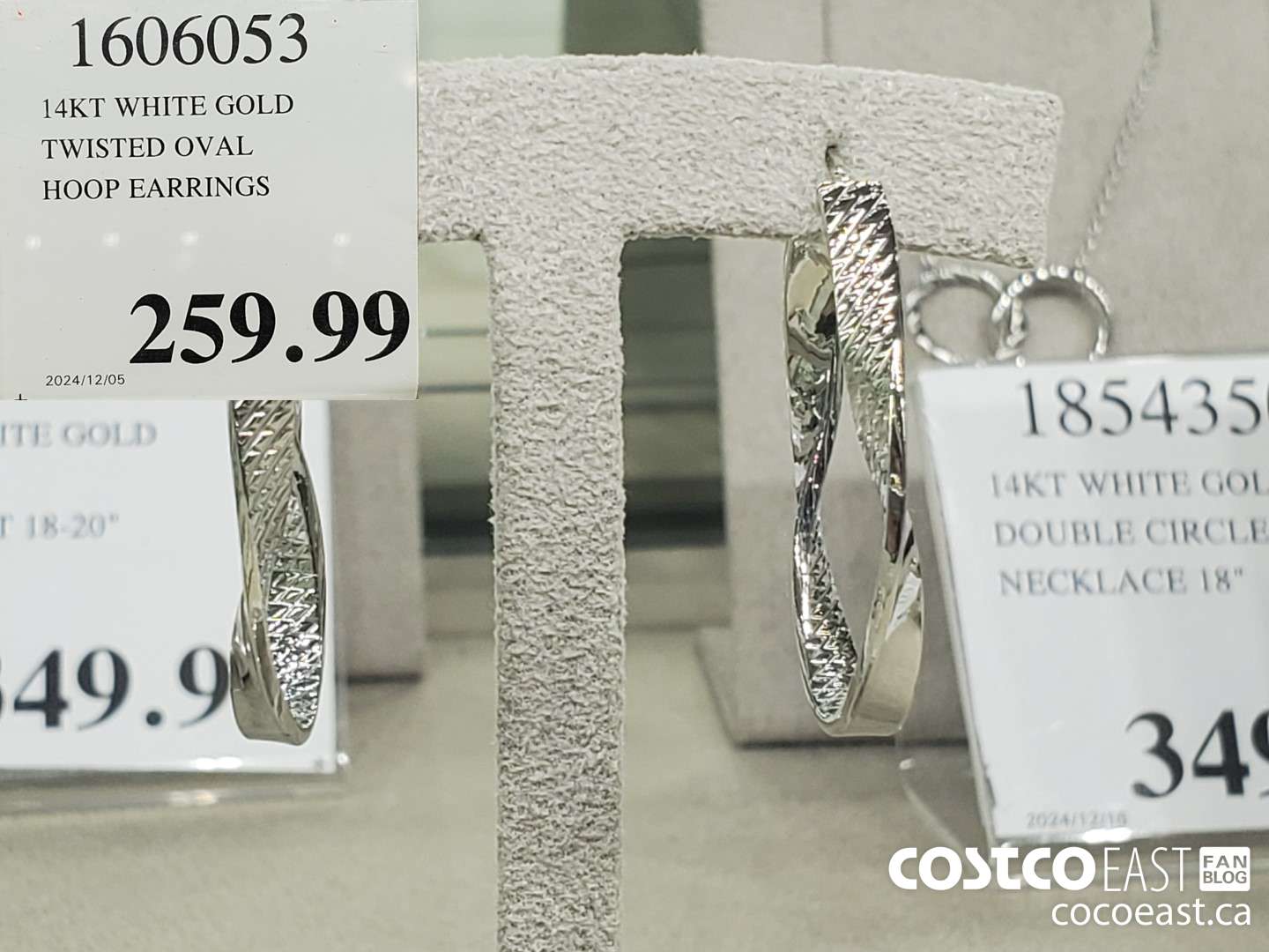 1606053 14KT WHITE GOLD TWISTED OVAL HOOP EARRINGS $259.99