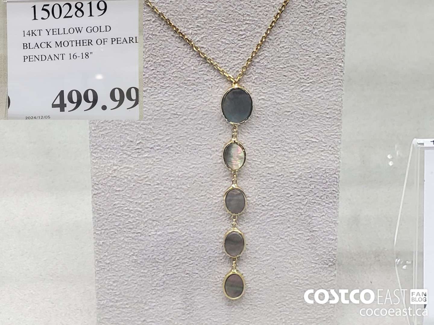 1502819 14KT YELLOW GOLD BLACK MOTHER OF PEARL PENDANT  $499.99