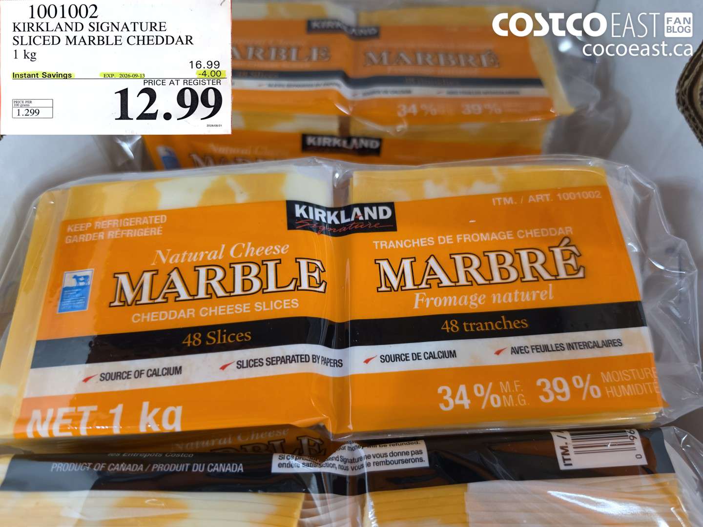 1001002 KIRKLAND SIGNATURE SLICED MARBLE CHEDDAR 1 KG ($4.00 INSTANT SAVINGS EXPIRES ON 2026-09-13) $12.99